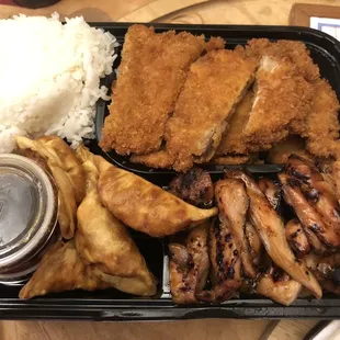 Chicken katsu, teriyaki, gyoza bento box