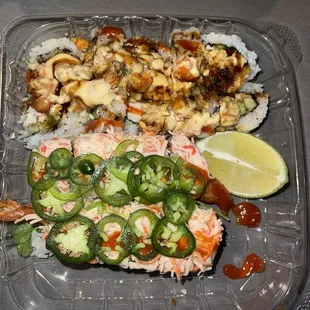 a plastic container with a variety of food