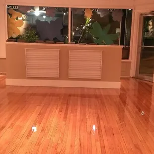 an empty room with a fish tank