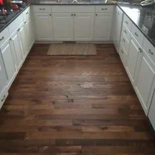 a kitchen with white cabinets