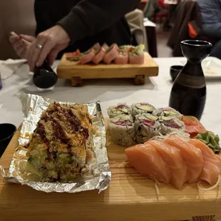 Rolls, sashimi, sake