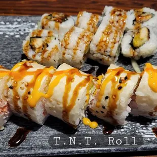 Top - Eel roll.  Bottom - T.N.T. Roll (specialty section)