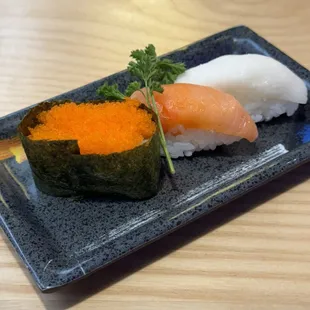 Masago (smelt roe), smoked salmon and escolar nigiri (L to R)