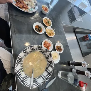 Rice dumpling soup with traditional Banchan (small side dishes that come with every entree)