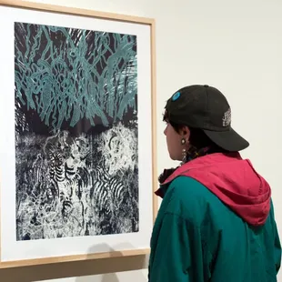 Image of person looking at artwork