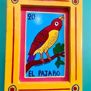 a colorful bird on a branch