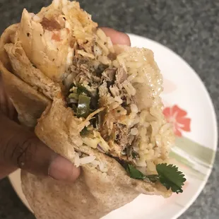 Chicken and Pork Burrito ($7.15) + 0.25 cents for getting thr burrito on a whole wheat tortilla