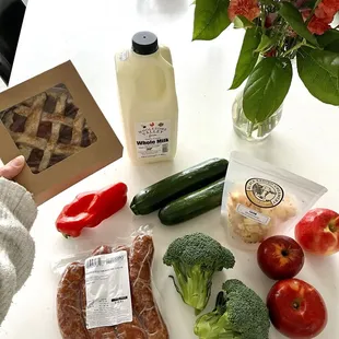 Whole A2/A2 milk, cherry pie, cajun seasoned cheese curds, apples, broccoli, zucchini, red pepper, and choriqueso smoked salchicha.