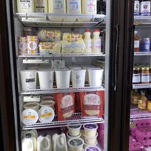 a refrigerator full of dairy products