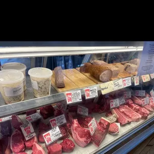 meat on display in a deli case