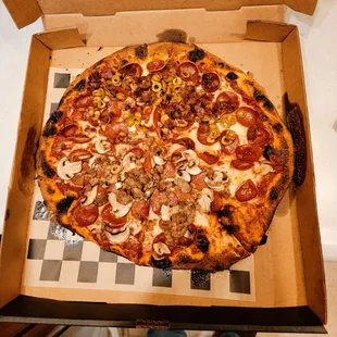 a pizza in a pizza box
