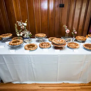 a variety of pies on a table