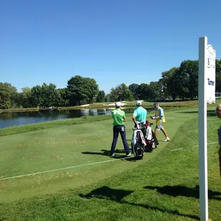 Players talking about hole 8 a par 3