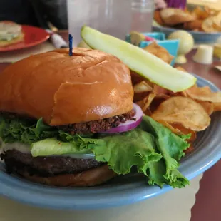big nasty burger (angus burger with fried green tomatoes and horsey sauce)