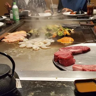 All your food groups ready...steak, chicken, salmon, shrimp and veggies
