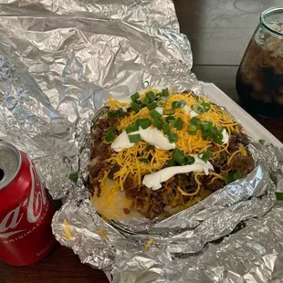 Baconator Stuffed potato with all the fixins. BBQ sauce not added yet.