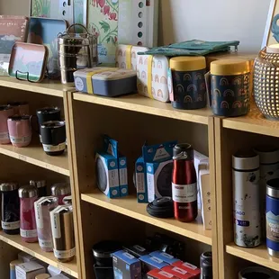 a shelf of coffee roasters