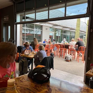 Indoor and Outdoor seating.  A few TV&apos;s with sports.