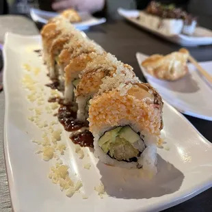 a sushi roll on a plate