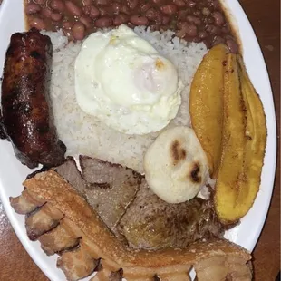 This place has the best Bandeja paisa and empanadas in vegas!