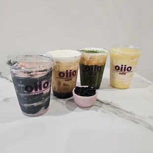 (left to right) Strawberry Big C, Tiger Milk Tea + Cream Cheese Foam, Matcha Milk Tea, Mango Lover