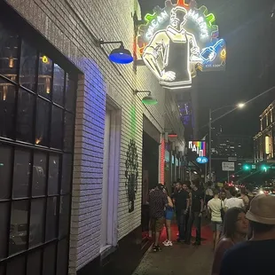 people walking down the sidewalk