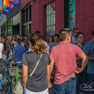A line all the way around the corner for our now famous "Anything In The House 46 cents" party, we served over 12,000 drinks June 26th 2015