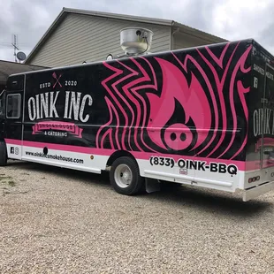 a pink and black truck