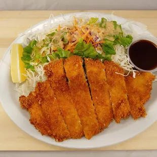 Chicken breast katsu ,or pork cutlet.