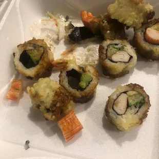 Deep fried California roll with plastic cook w it??