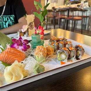 Salmon sashimi, spicy Tuna Cucumber Roll and Shrimp Tempura Roll