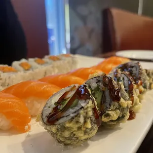 a plate of sushi on a table