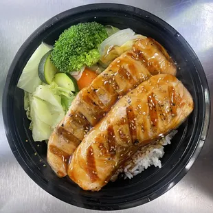 Salmon Teriyaki Bowl, steamed vegetables, white rice, topped off with teriyaki sauce
