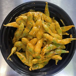 Diabla Edamame, steamed soy beans, mix with specialty sauce.