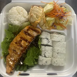 A bento box on the go, choose 2 entrees of your choice, served with miso soup, 3 pot stickers, white rice and house salad