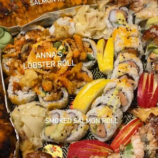 Sushi platter: Spicy Baked Salmon Roll, Anna's Lobster, Smoked Salmon, Dragon roll