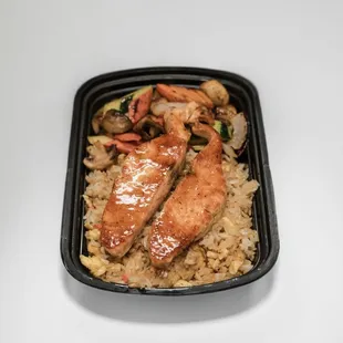a meal in a black container