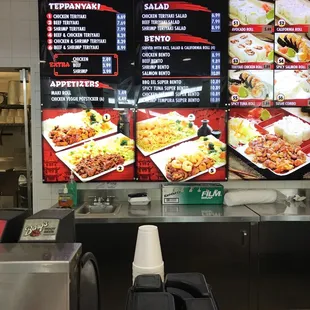 menus on the wall of a restaurant