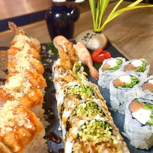 Volcano roll, Shrimp tempura roll and a Philadelphia roll