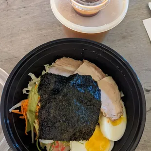 Spicy Ton with pork to go.