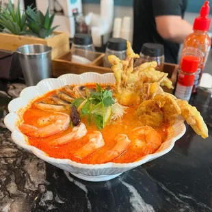 Taruntula   Lobster broth was amazing. I didn't do squid FYI.