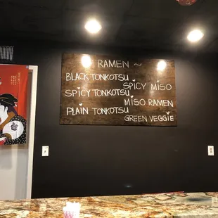 Ramen menu on the wall- they have a full menu that you receive.