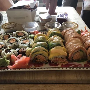 Left to Right: Cooked spicy salmon roll, Firecracker roll, Cardinal Roll
