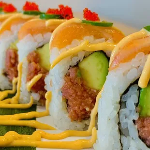 a row of sushi rolls