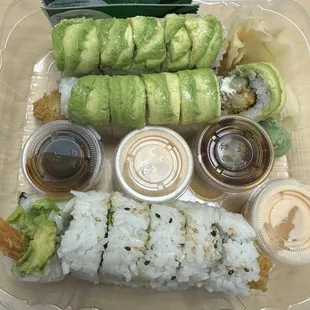 Dragon Roll on top and Shrimp Tempura Roll on the bottom.  Really good!