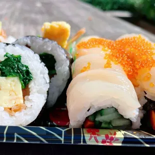 Foto Roll (Tamago, spinach, shiitake, kanpyo); Pearl Roll (avocado, cucumber, shiso leaf, scallop, tobiko, kizami wasabi &amp; ponzu.)