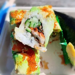 a close up of a piece of sushi