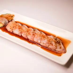 a plate of food with sauce