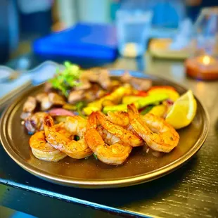 Hibachi Jumbo shrimp and Prime Ribeye. broccolini, red bell pepper, shiitake mushroom, yellow squash, &amp; purple onions. 5 out of 5.