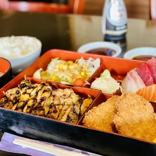 Lunch specials . Tonkatsu, teriyaki chicken, and sashimi.